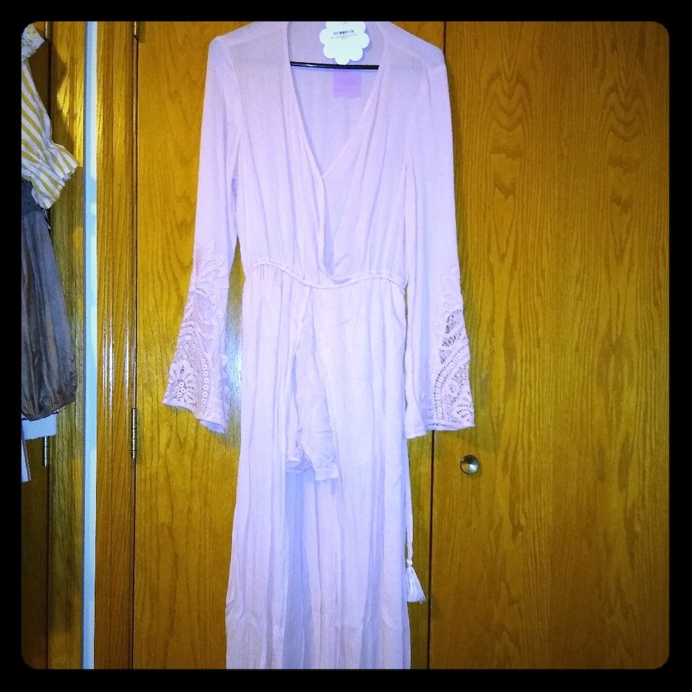 Long sleeve and skirt romper brand new